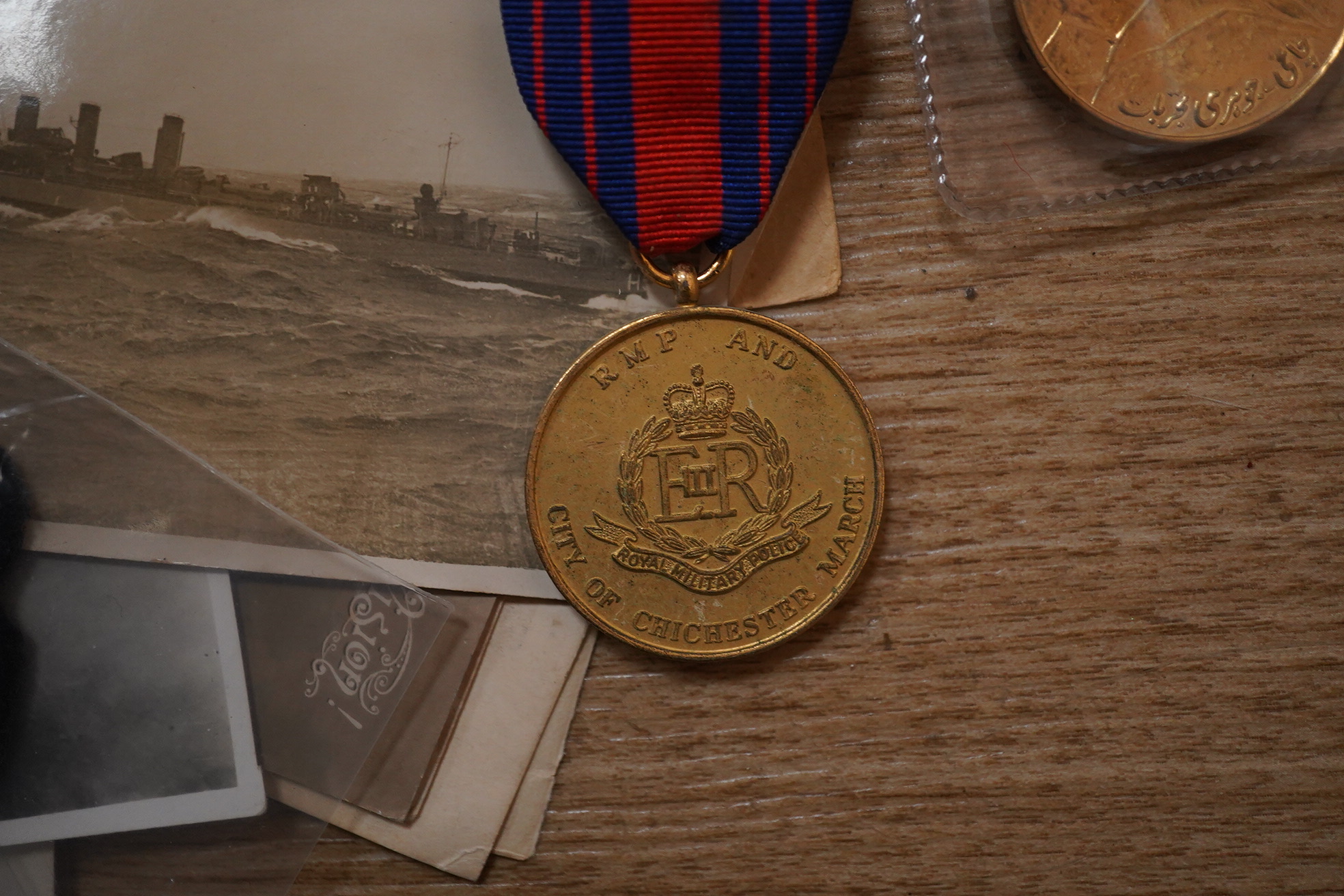 A quantity of various military ephemera to include a Coldstream guards matchbox holder, buttons, badges, National Registrarion Identity Card, various photos and letters etc. condition - varies